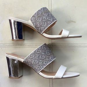 Never worn silver heel shoes NWT